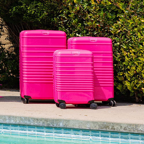 The Medium Check-In Roller in Barbie? Pink