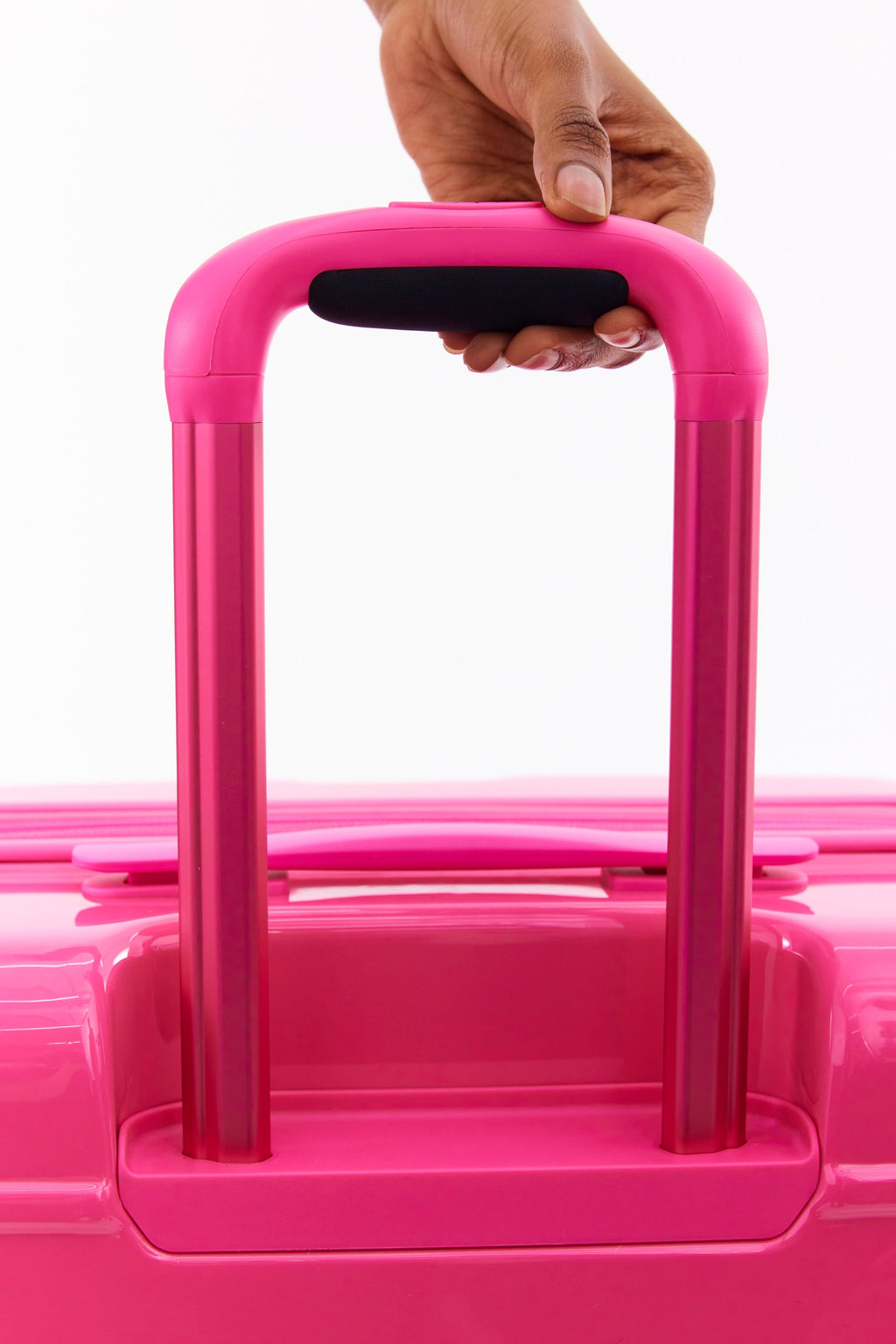 The Medium Check-In Roller in Barbie? Pink